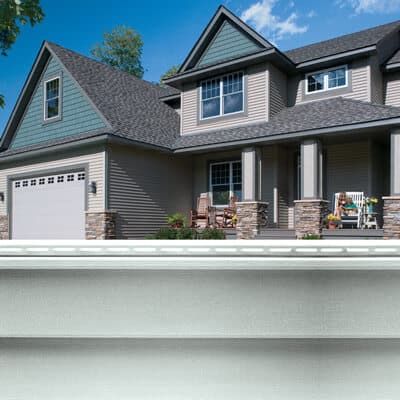 house exterior with brown siding and matching roofing design