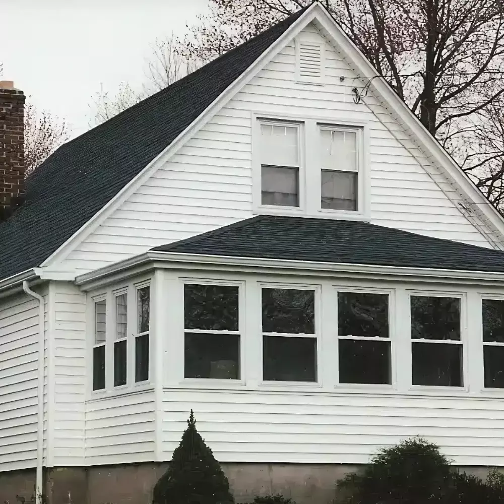 Vinyl Siding vs Side-by-side comparison of vinyl siding options for home exterior design