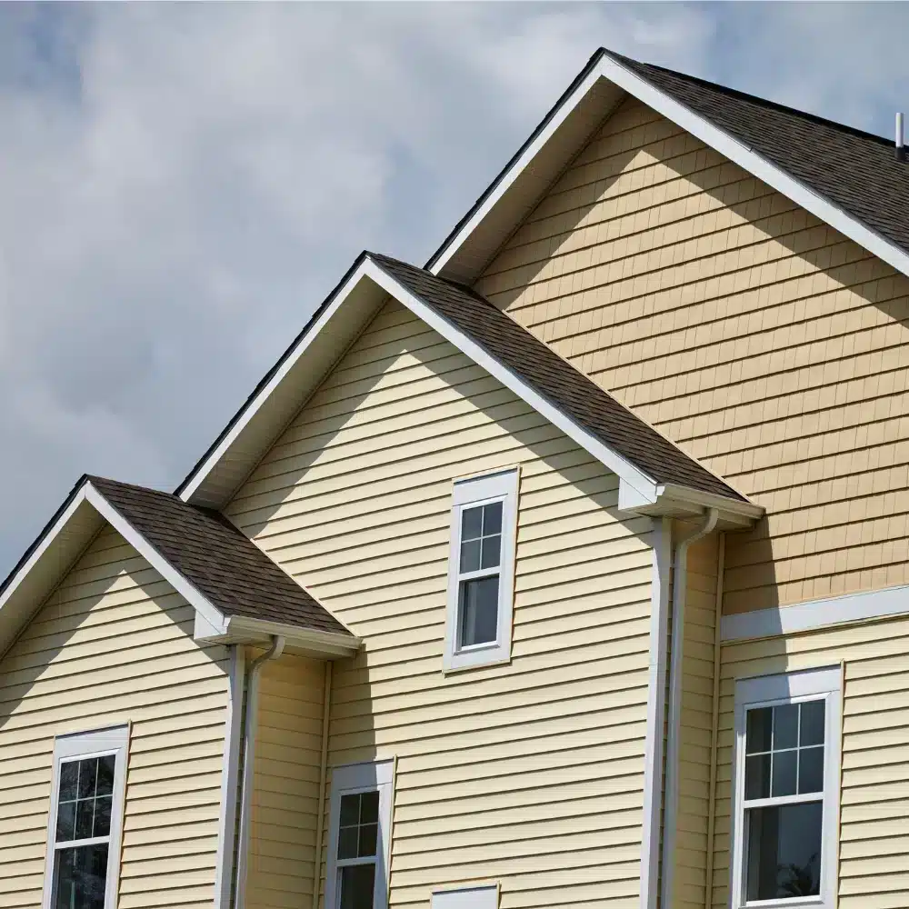 Finding Vinyl Siding Contractors in Connecticut_ Quality Shake Vinyl Siding Options Near Me Professional vinyl siding contractor installing exterior siding on a home in Connecticut