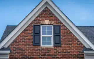 Home exterior in Connecticut with new siding and windows showcasing improved curb appeal and increased property value