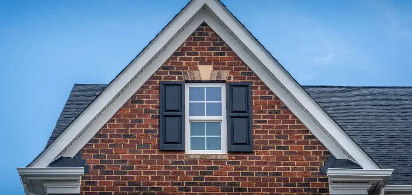 Exterior Renovation ROI: How New Siding and Windows Increase Home Value in Connecticut Home exterior in Connecticut with new siding and windows showcasing improved curb appeal and increased property value