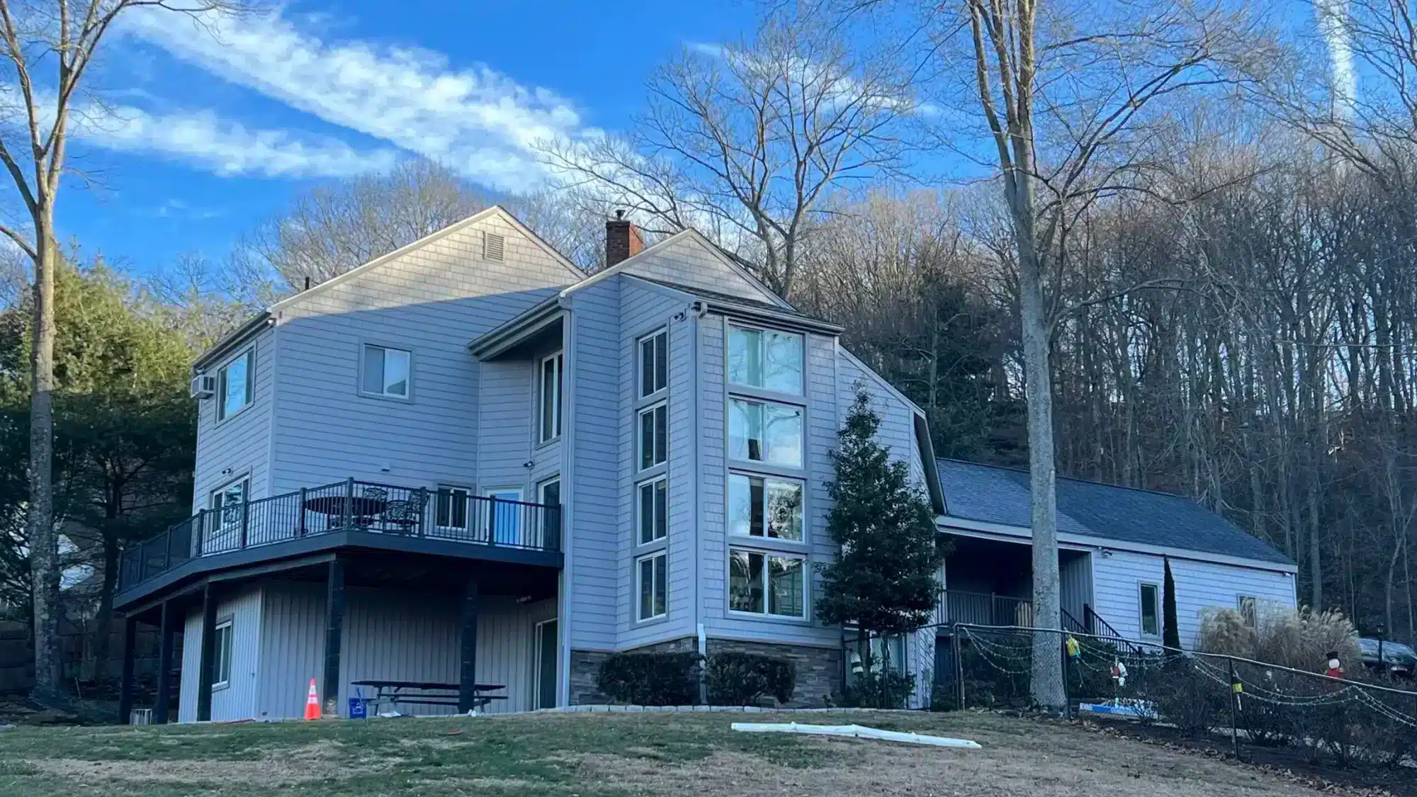 why-storm-damage-often-leads-to-hidden-siding-issues-that-homeowners-overlook Storm damage causing hidden siding issues on a residential home