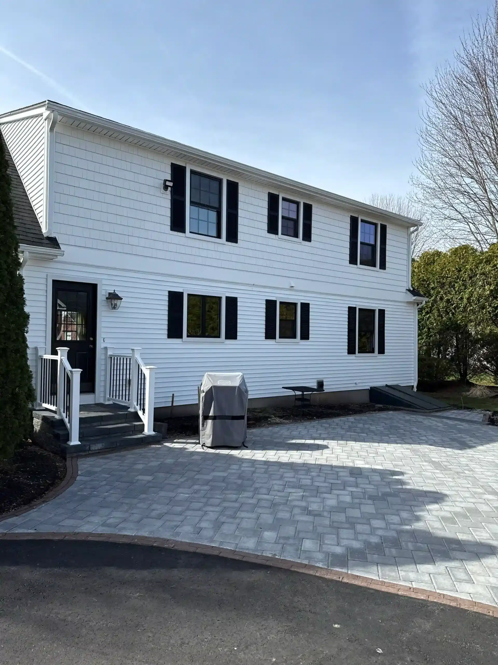 black-windows-suffield-ct Modern black-framed windows on a house in Suffield, Connecticut