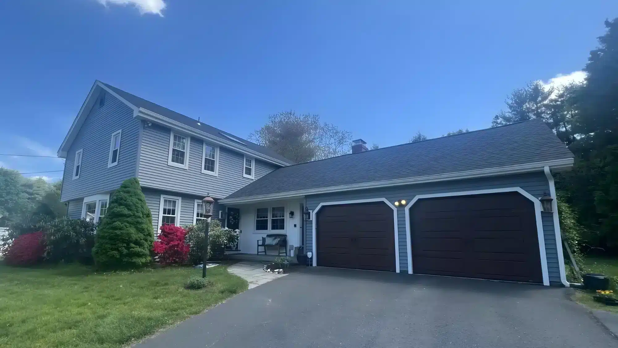 understanding-the-role-of-a-vinyl-siding-contractor-in-home-exterior-projects Vinyl siding contractor working on a home exterior project