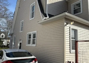 Quality siding and window replacement project completed in Hartford CT by Peter L Brown Roofing Contractors featuring upgraded home exterior improvements