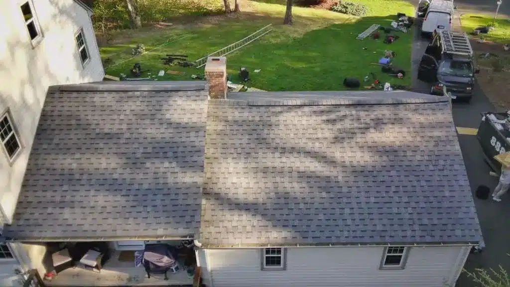 atlas-stormmaster-architectural-roof-replacement-simsbury-ct-peter-l-brown (5) Atlas StormMaster architectural roof replacement completed in Simsbury CT by Peter L Brown Roofing Contractors showcasing durable upgraded shingles on residential home exterior