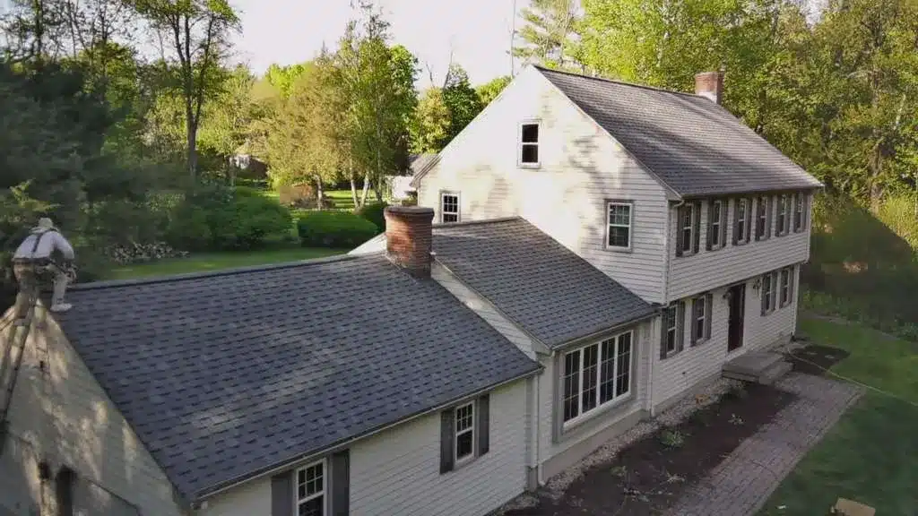 atlas-stormmaster-architectural-roof-replacement-simsbury-ct-peter-l-brown (6) Atlas StormMaster architectural roof replacement completed in Simsbury CT by Peter L Brown Roofing Contractors showcasing durable upgraded shingles on residential home exterior