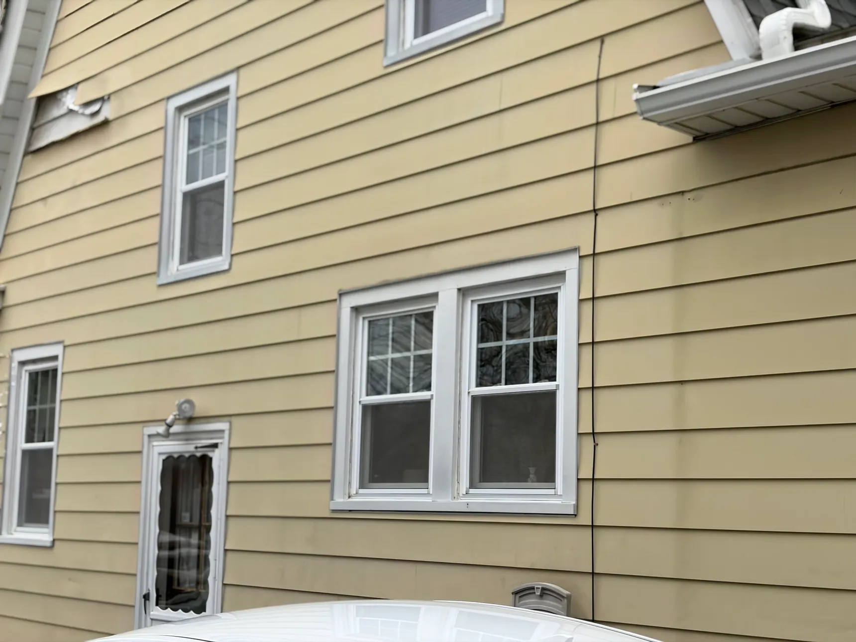 Enhanced After Siding and Window Replacement Hartford CT Peter L Brown Quality siding and window replacement project completed in Hartford CT by Peter L Brown Roofing Contractors featuring upgraded home exterior improvements