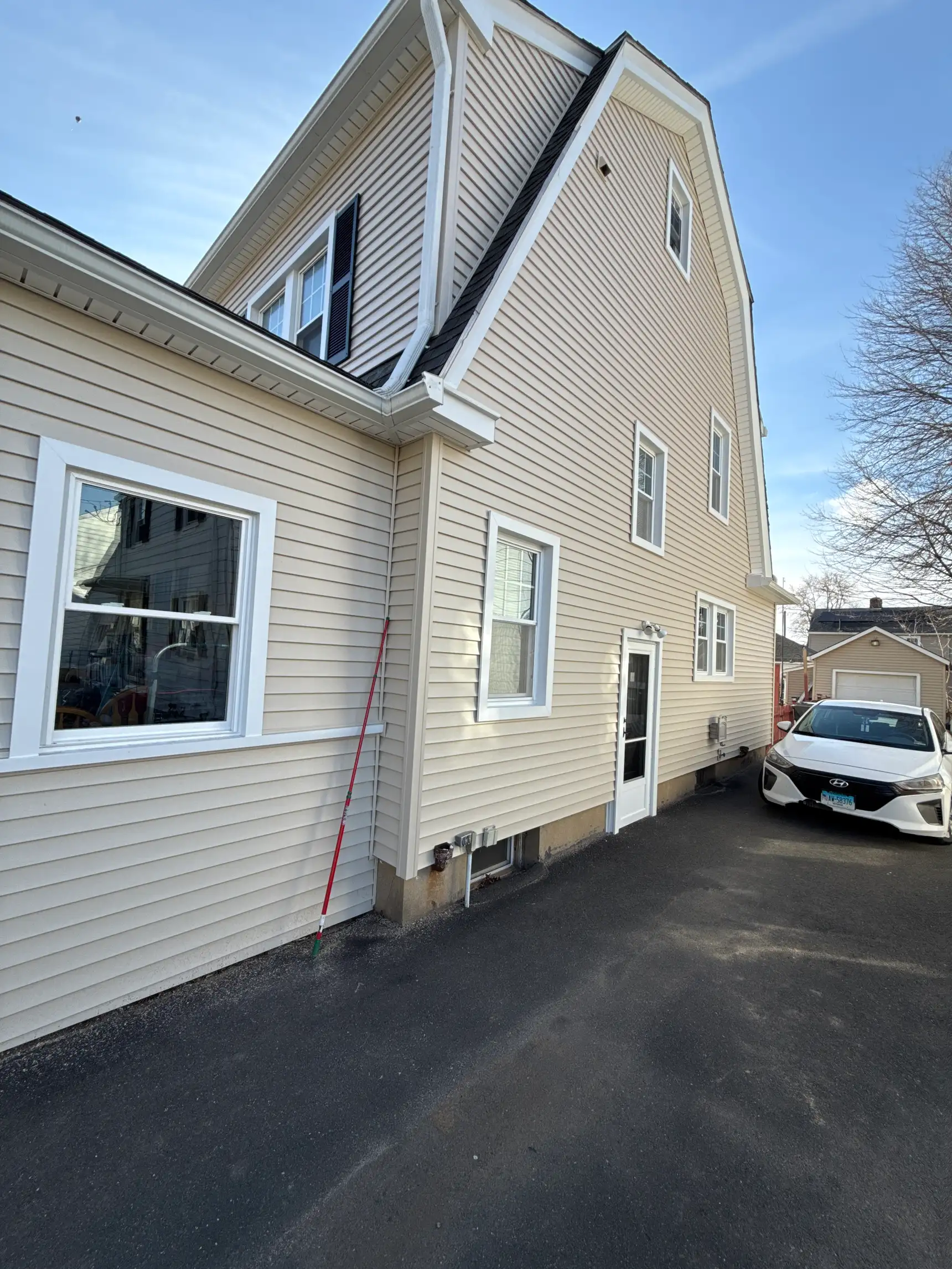 Enhanced After Siding and Window Replacement Hartford CT Peter L Brown Quality siding and window replacement project completed in Hartford CT by Peter L Brown Roofing Contractors featuring upgraded home exterior improvements