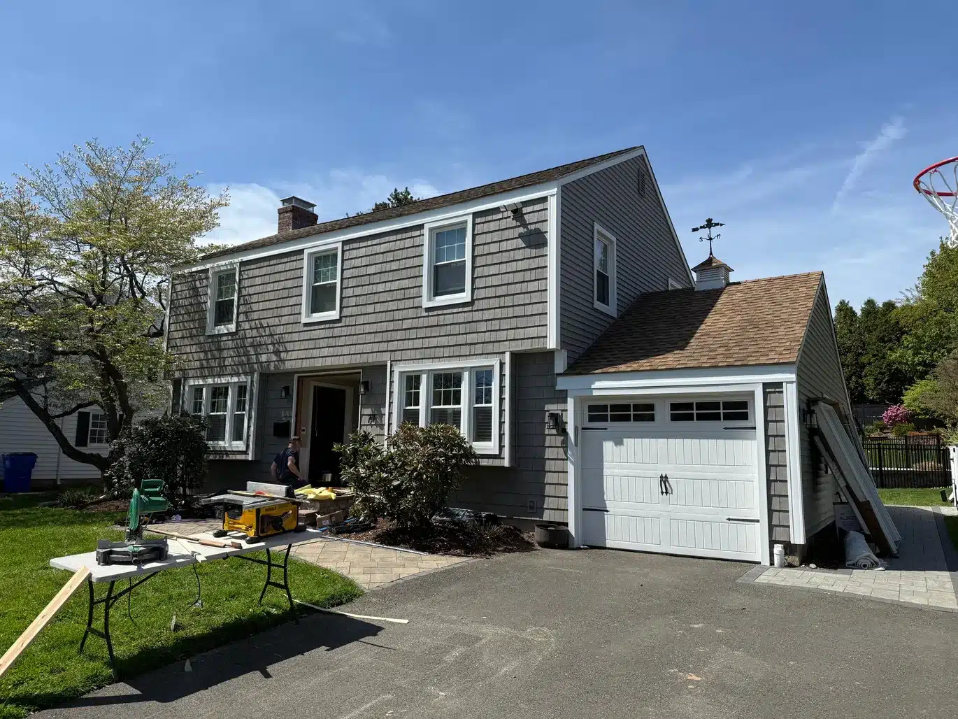 Remodeled After Vinyl Siding Vinyl Shake ProVia Entry Door Aluminum Trim Installation West Hartford CT Peter L Brown Completed exterior renovation project in West Hartford CT featuring vinyl siding, vinyl shake, ProVia entry door, and aluminum trim installation by Peter L Brown Roofing Contractors showcasing a finished residential home upgrade