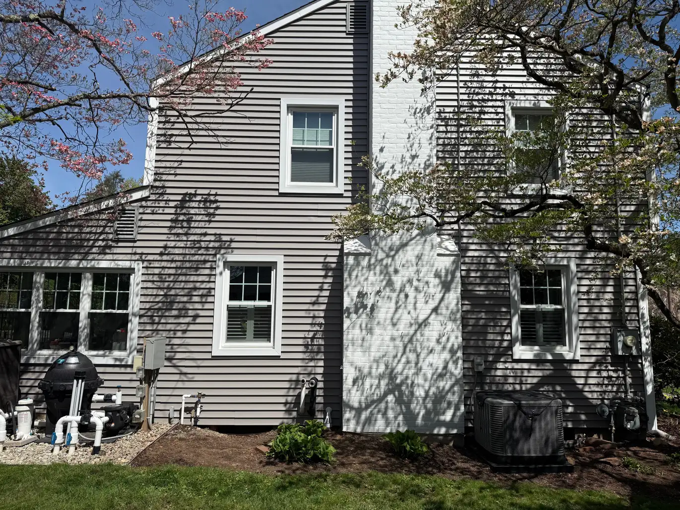 Renovated After Vinyl Siding Vinyl Shake ProVia Entry Door Aluminum Trim Installation West Hartford CT Peter L Brown Completed exterior renovation project in West Hartford CT featuring vinyl siding, vinyl shake, ProVia entry door, and aluminum trim installation by Peter L Brown Roofing Contractors showcasing a finished residential home upgrade