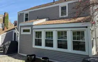 Professional window replacement contractors installing energy-efficient windows on a residential home in Wethersfield Connecticut