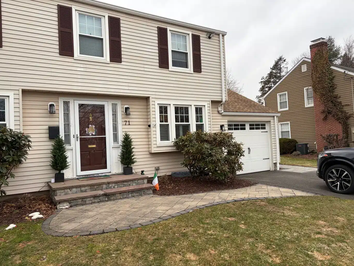 Updated Vinyl Siding Vinyl Shake ProVia Entry Door Aluminum Trim Installation West Hartford CT Peter L Brown Completed exterior renovation project in West Hartford CT featuring vinyl siding, vinyl shake, ProVia entry door, and aluminum trim installation by Peter L Brown Roofing Contractors showcasing a finished residential home upgrade