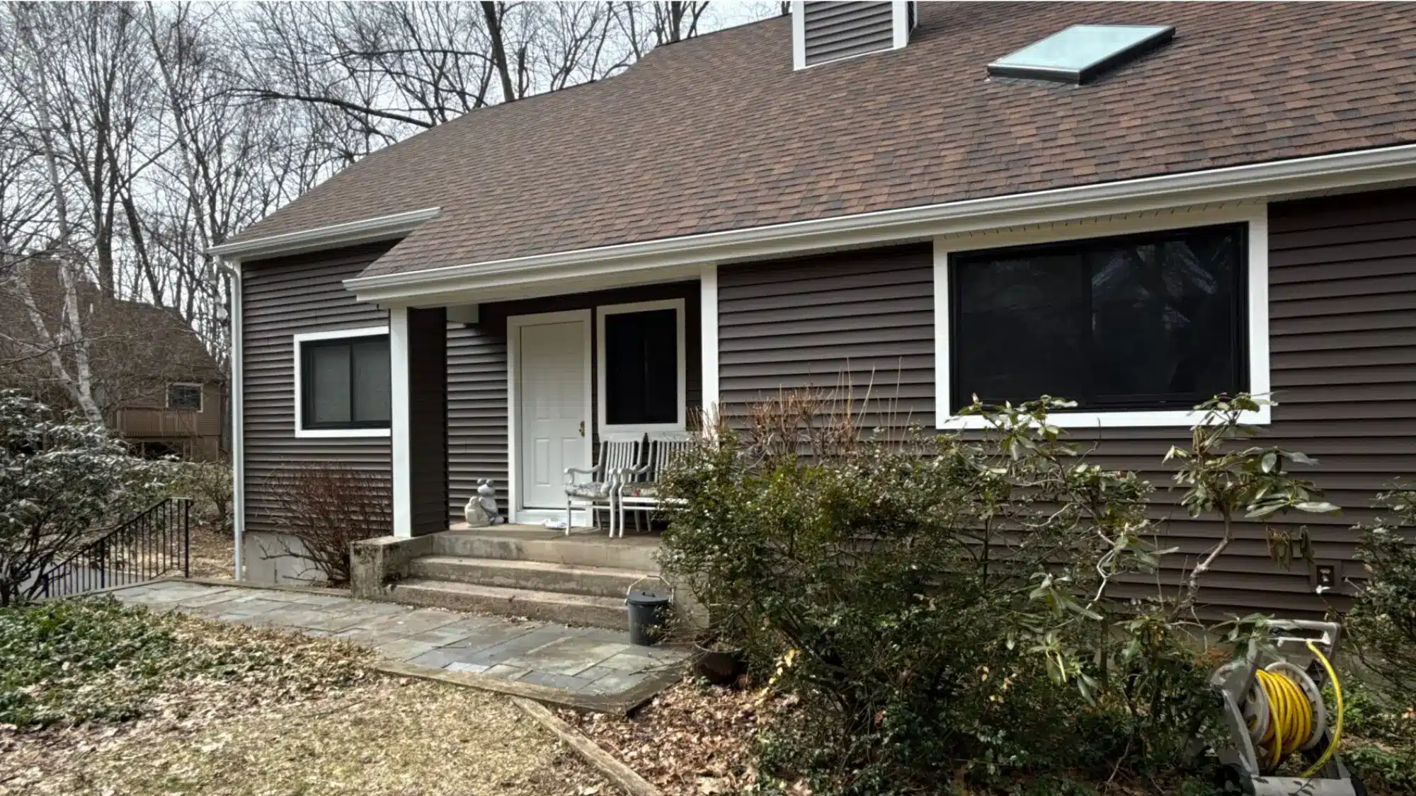 choosing-the-right-door-replacement-company-in-windsor-locks-and-east-granby-starts-with-these-key-considerations A well-installed new front door showing quality craftsmanship on a modern home.
